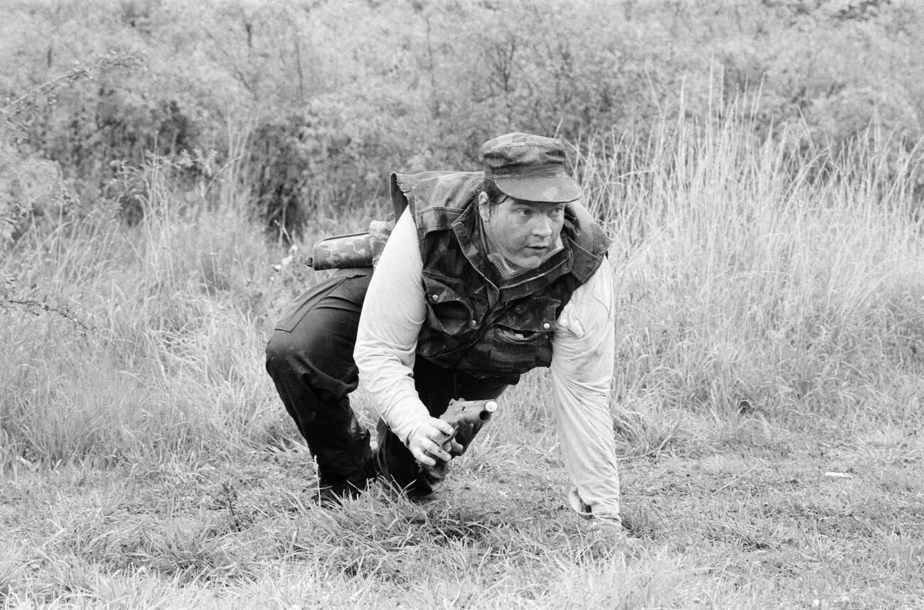 Meat Loaf Participating In A Survival Game In Common Wood, Near Hatfield, 1986.