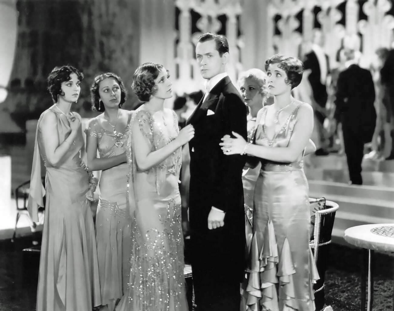 Robert Montgomery In Our Blushing Brides, 1930.