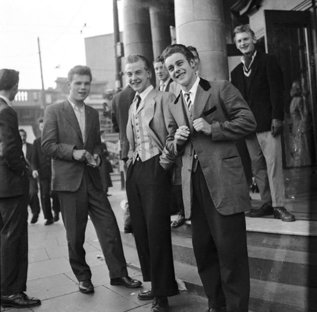 A Teddy Boy Shows Off His Suit, 1955.