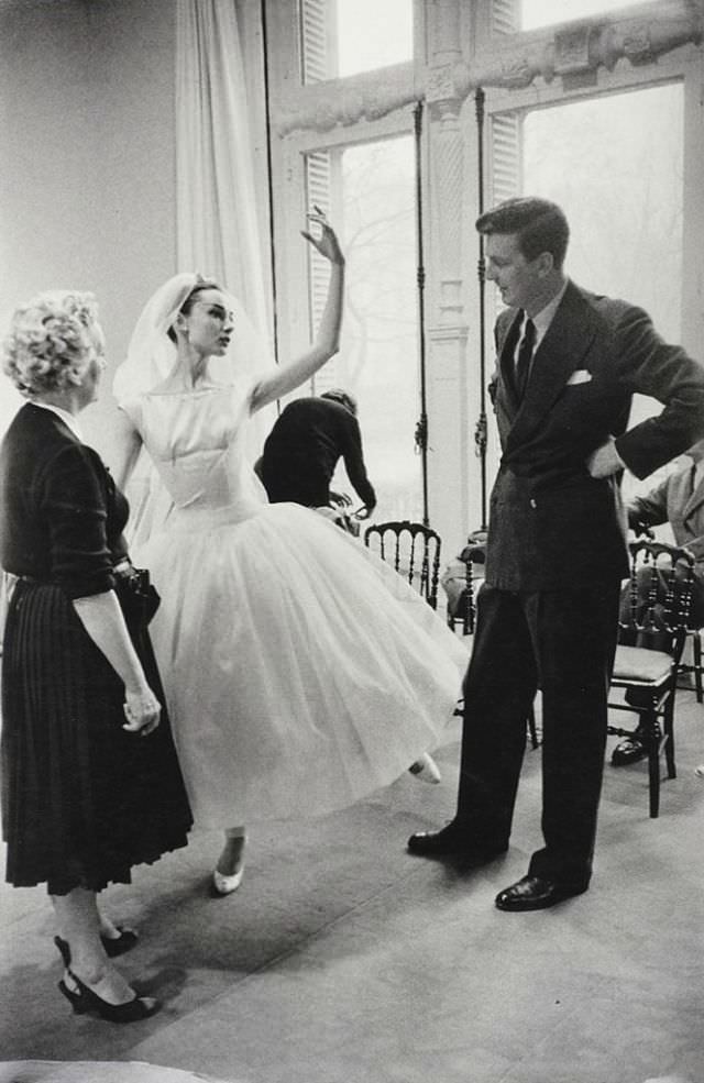 Audrey Hepburn Photographed By David Seymour (With Hubert De Givenchy And Georgina, His Seamstress) At Maison Givenchy During Fittings For The Film 'Funny Face&Amp;Quot; 1956