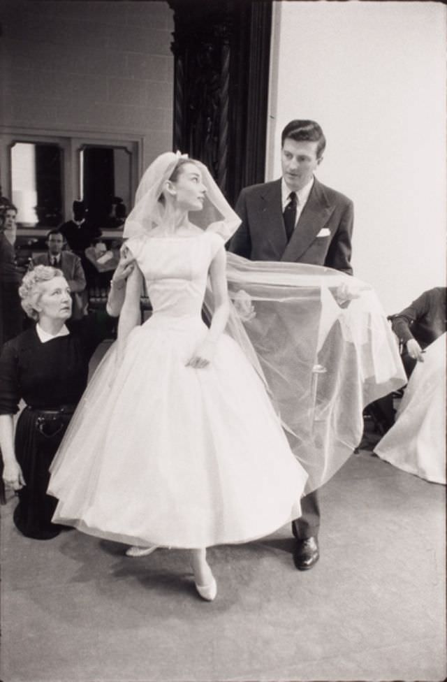 Audrey Hepburn Photographed By David Seymour (With Hubert De Givenchy And Georgina, His Seamstress) At Maison Givenchy During Fittings For The Film 'Funny Face&Amp;Quot; 1956