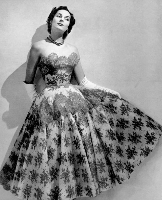 Susanne Erichsen Is Wearing A Chantilly Lace Dress Of Brown Over Pale Sand By Jacques Heim, Photo By Georges Saad, 1954