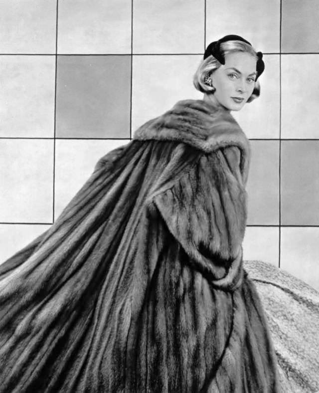 Ghislaine Arsac In Royal Pastel Emba Mink Coat Worn Over A Gold Lamé Dress, Both By Jacques Heim, Photo By Philippe Pottier, 1955
