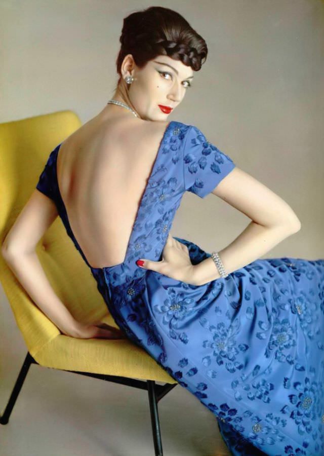 Simone D'Aillencourt Is Wearing A Beautiful Blue, Silk Faille Embroidered Evening Dress Featuring A Very Low Back By Jacques Heim, Photo By Philippe Pottier, 1957