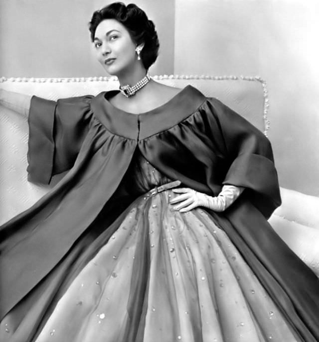 Teresita Montez In Gray Organza Coat With Wide Sleeves Worn Over Beautiful Evening Gown Of Gray And Yellow Tulle Appliqued With Topaz Cabochons By Jacques Heim, Photo By Philippe Pottier, 1952