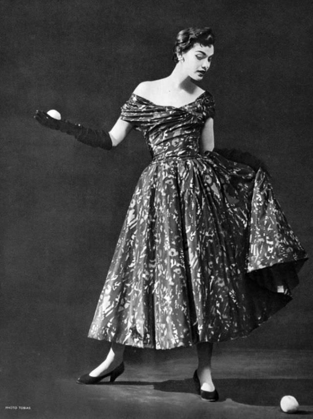 Joan Whelan In Taffeta Print Dress With Off-Shoulder Draped Neckline By Jacques Heim, Photo By Herbert Tobias, 1953