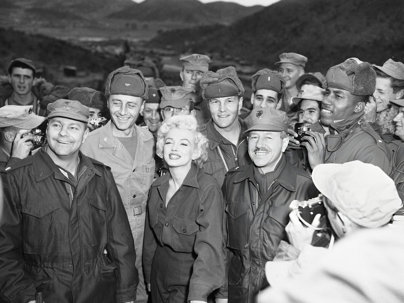 Marilyn Monroe Posing With Brig. General Robert Hogaldoom And Col. William K. Jones, 1950S.