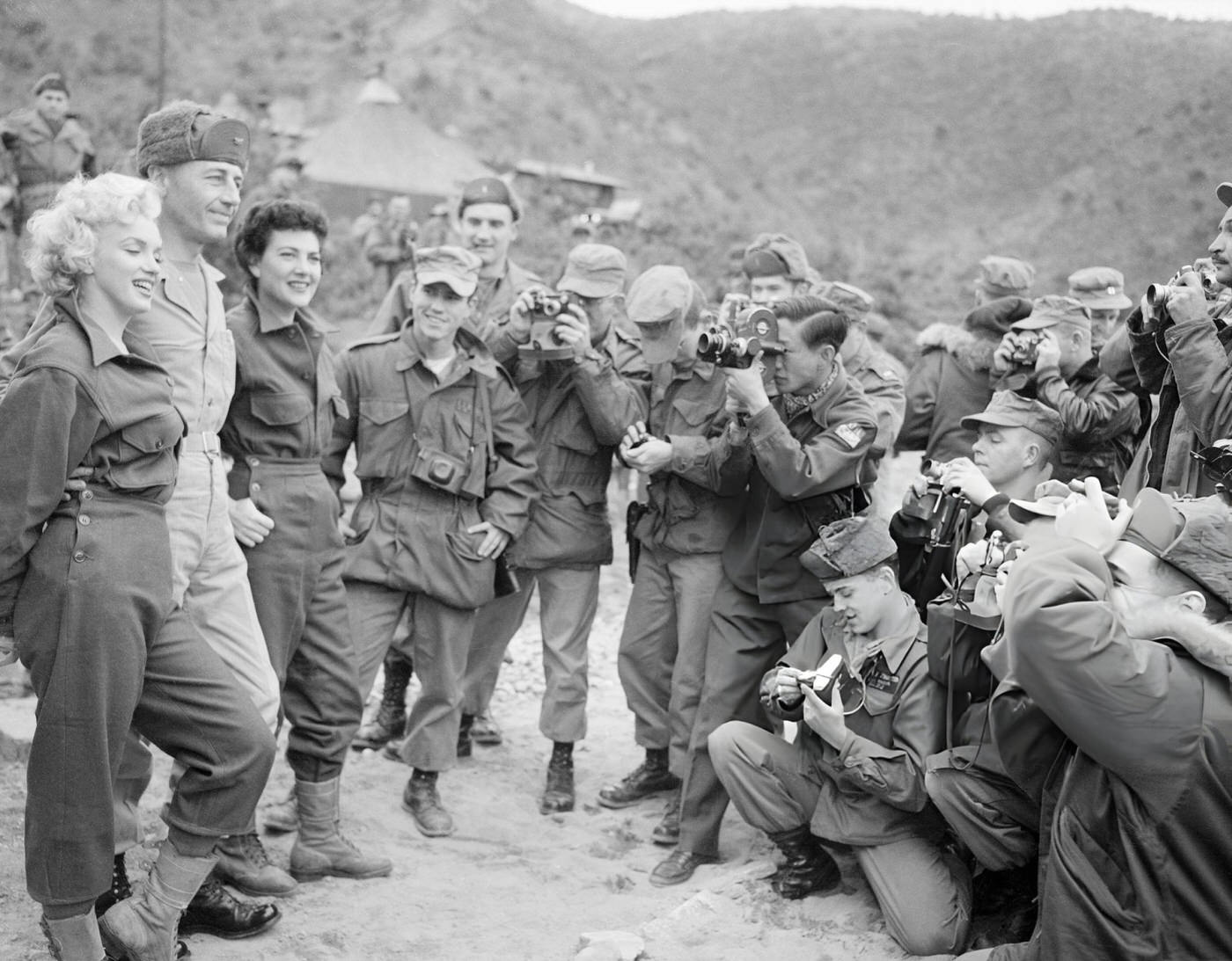 Marilyn Monroe (Left) Stands With Marine Col. William K. Jones And Jean O'Doul, 1950S.