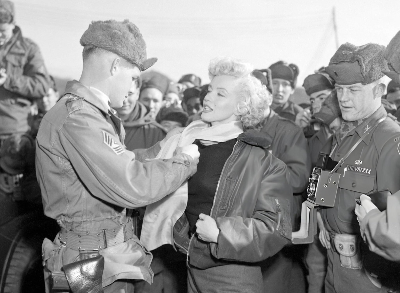 Master Sgt. Guy Morgan Presenting A 25Th Division &Amp;Quot;Wolfhounds&Amp;Quot; Scarf To Marilyn Monroe, 1954.