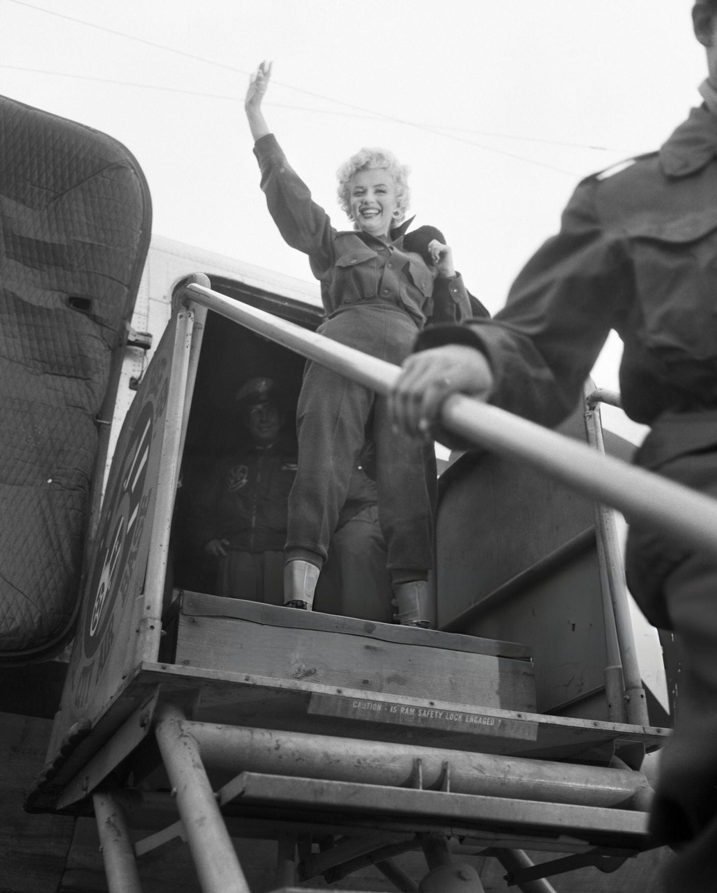 Blonde And Beautiful Marilyn Monroe Waves To Hundreds Of Gi'S, 1954.