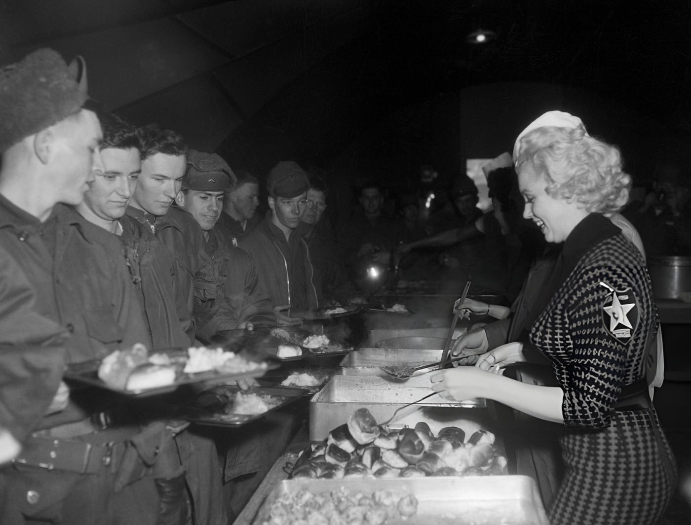 Marilyn Monroe Dishing Out Chow To Gis, 1954.