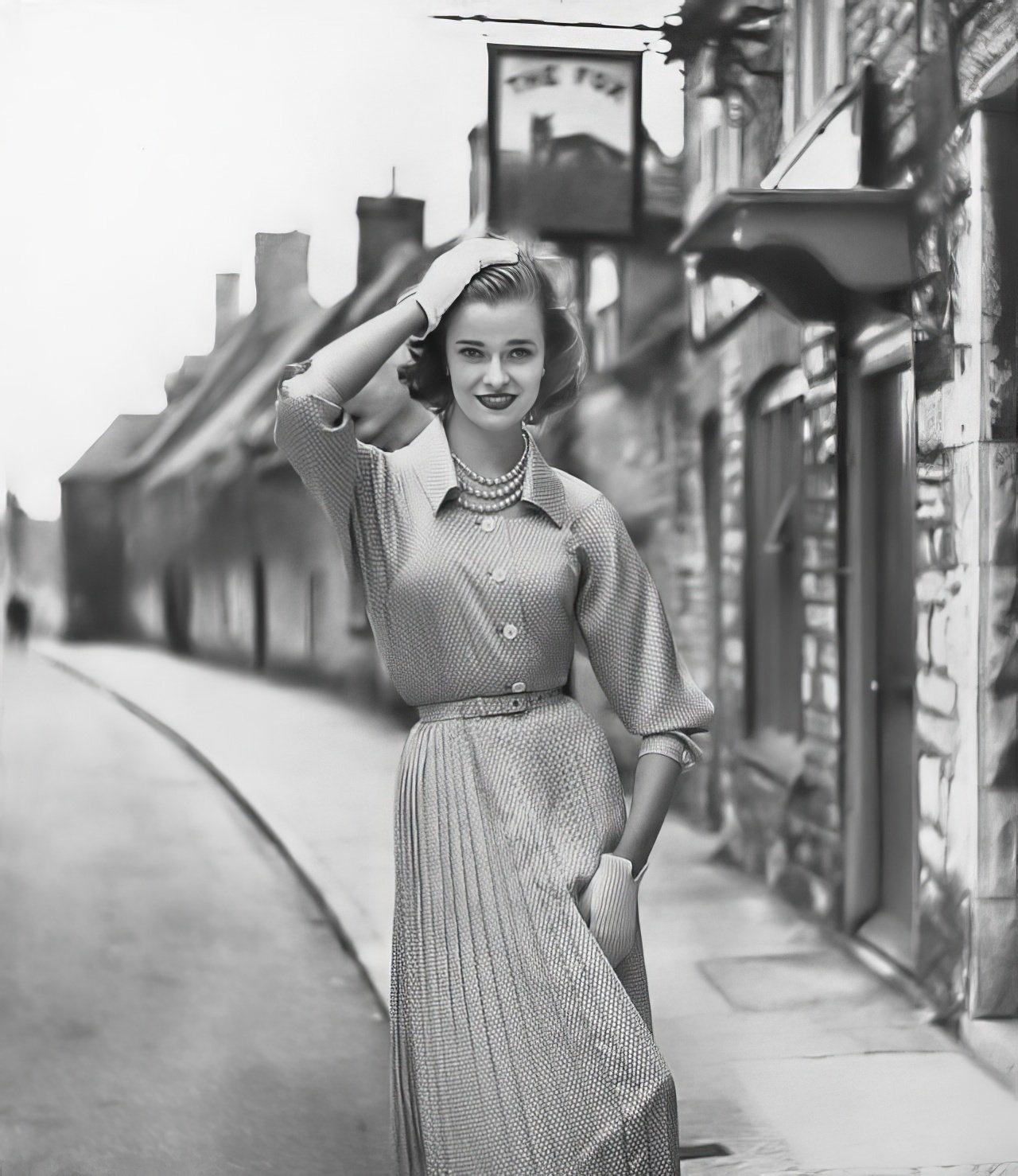 Susan Abraham In A Pale Gray Tie-Silk Dress Ringed With White, 1952.