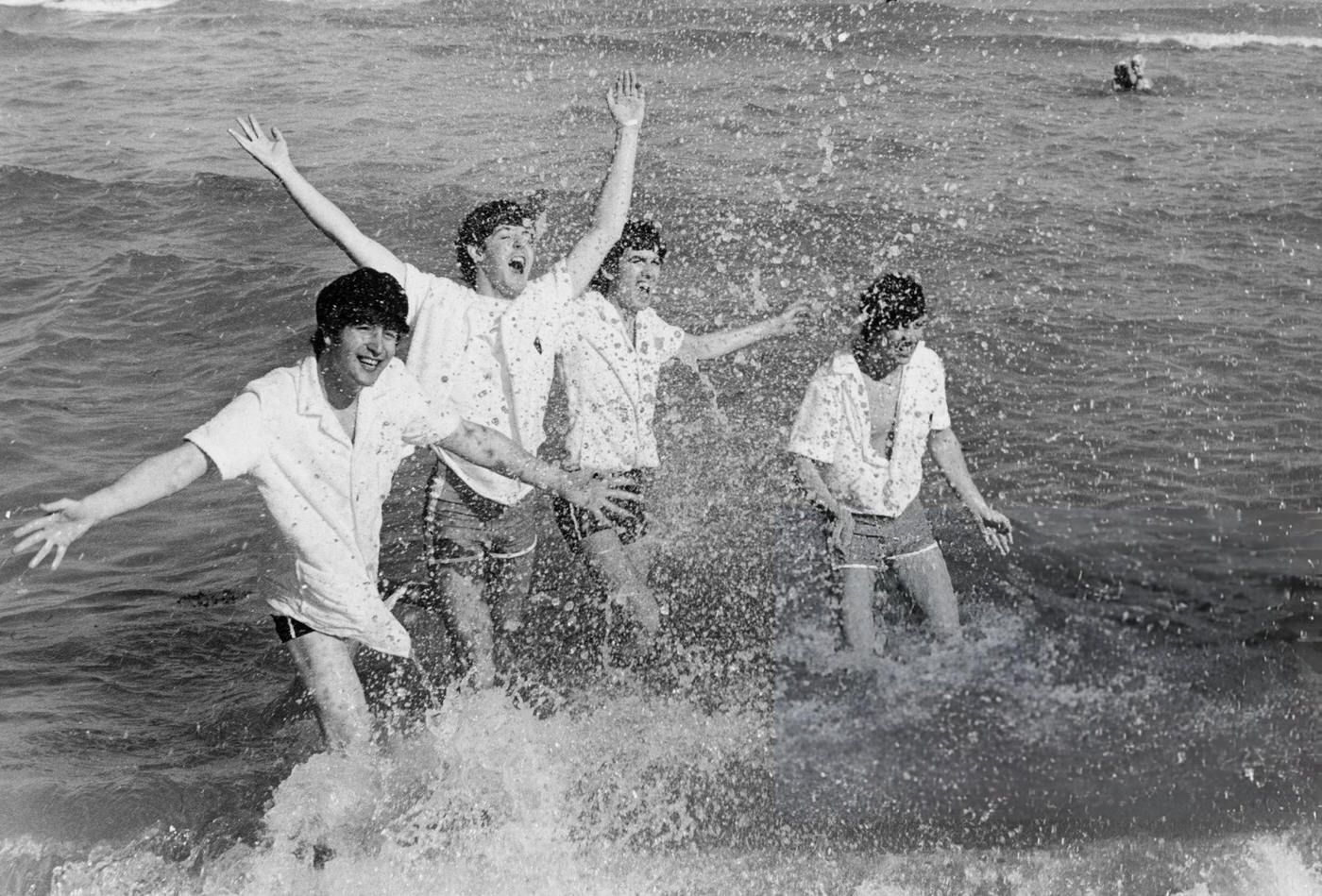 The Beatles Frolicking In The Surf At Miami Beach, Florida, 1964.