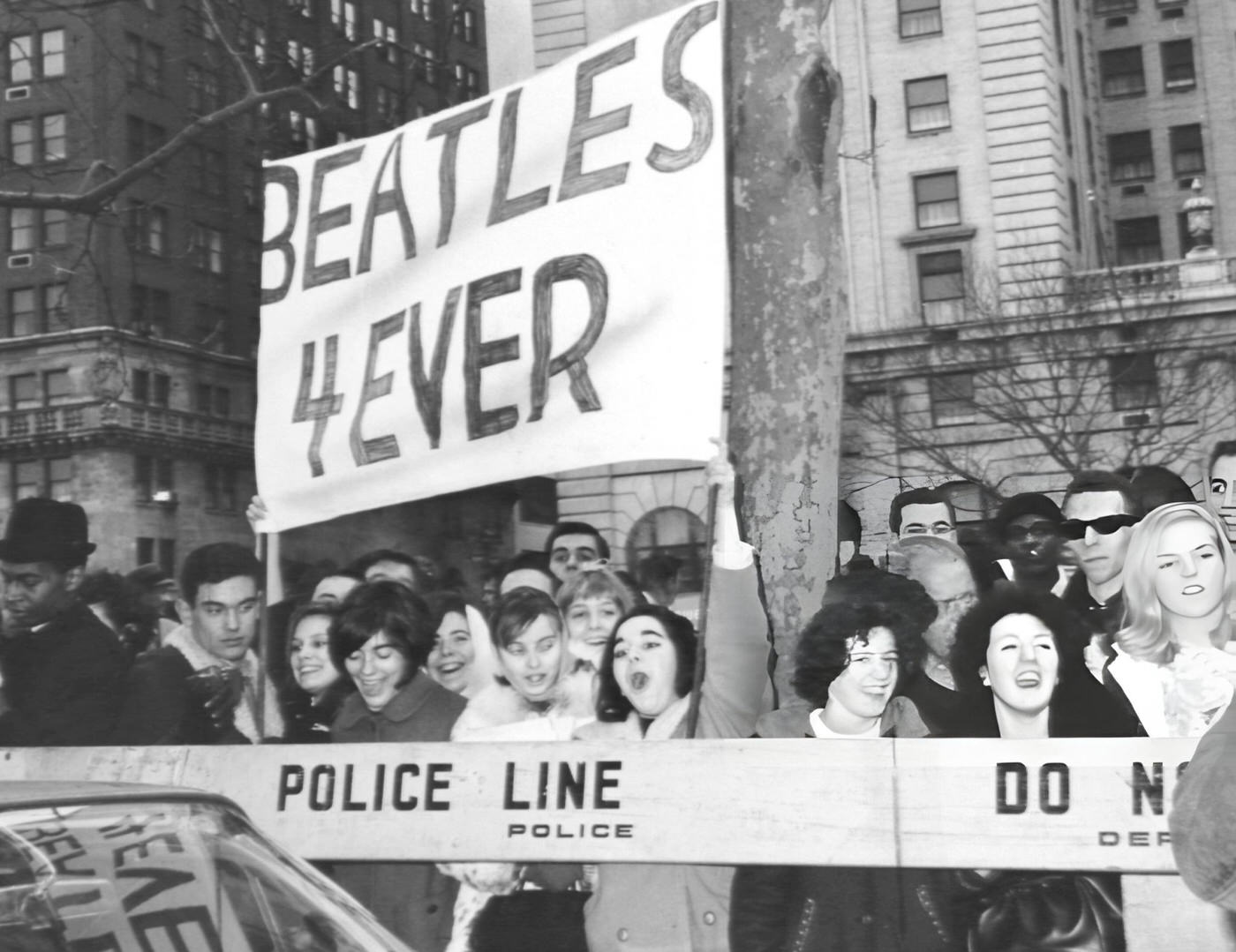 Beatles Fans Stand Outside The Plaza Hotel On Fifth Avenue Where They Hope To Catch A Glimpse Of The Musicians, 1964.