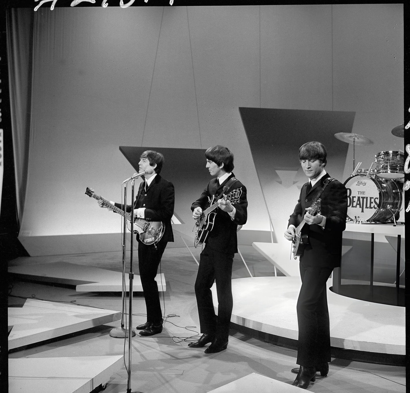 The Beatles, Performing, 1964.