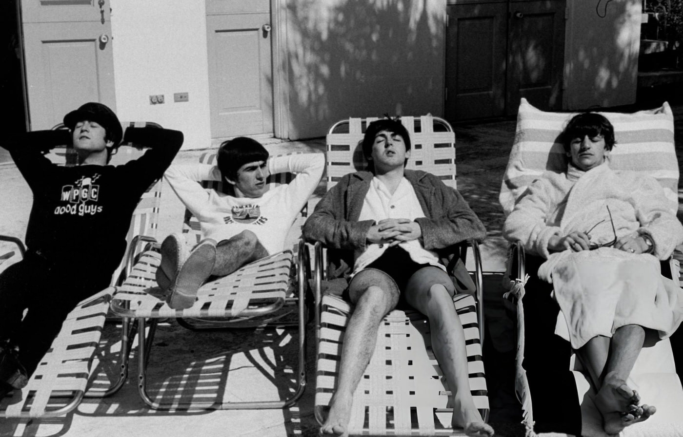 John Lennon, George Harrison, Paul Mccartney &Amp;Amp; Ringo Starr, Members Of British Rock Group, The Beatles, Relaxing On Lounge Chairs At Poolside Of The Deauville Hotel.