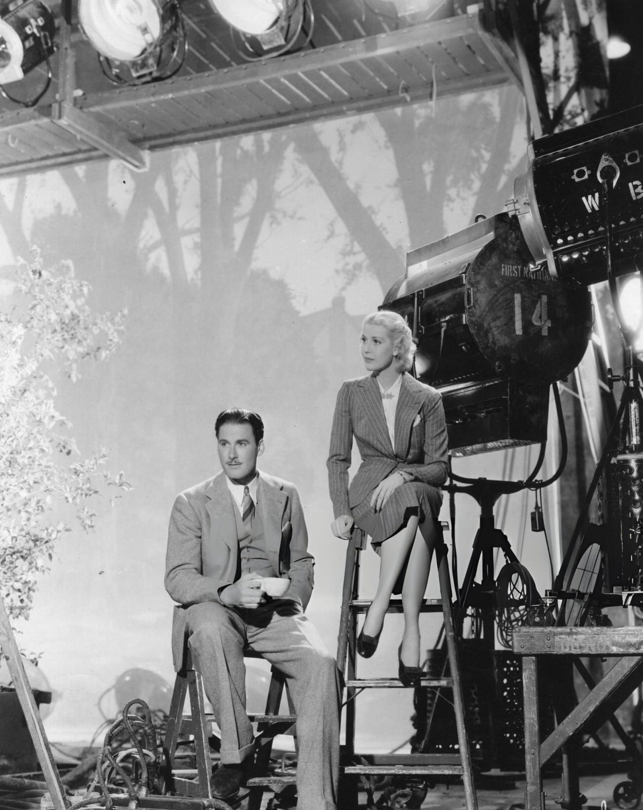 Actors Errol Flynn And Anita Louise On The Set Of The Film 'The Green Light', A Melodrama Set In The World Of Medicine, 1930S.