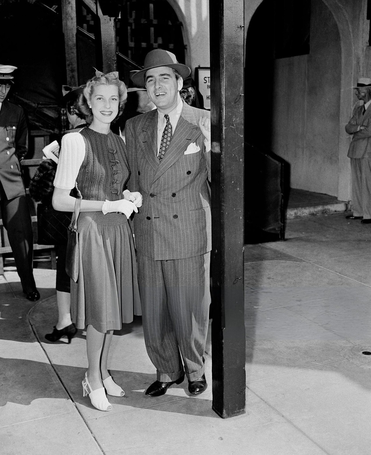 Anita Louise And Husband Producer E. Maurice Adler Pose On Set In Los Angeles, California, Circa 1940.