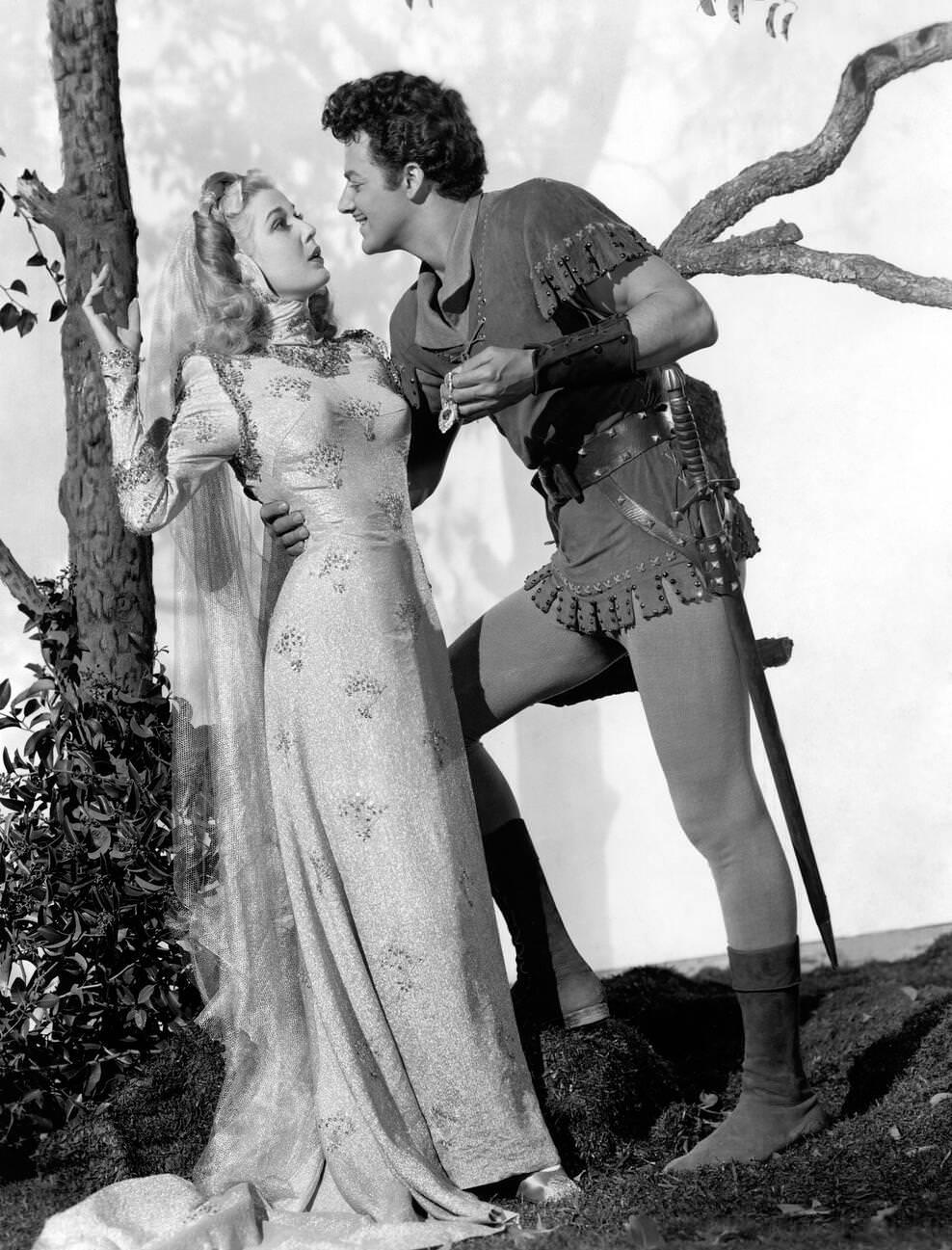 Anita Louise And Cornel Wilde On-Set Of The Film 'The Bandit Of Sherwood Forest', 1946.