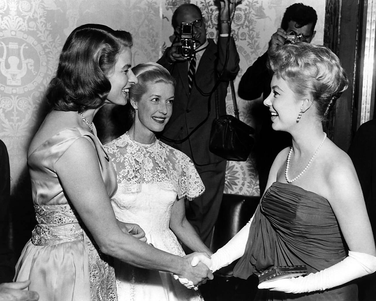 Swedish Actress Ingrid Bergman With Anita Louise And Mitzi Gaynor At A Reception In Hollywood, 1959.