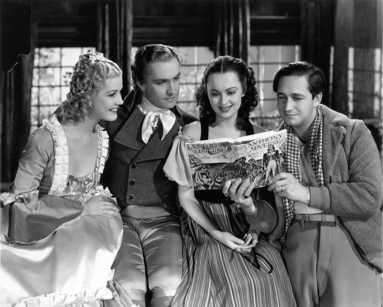 Anita Louise, Fredric March, Olivia De Havilland And Director Mervyn Leroy On The Set Of 'Anthony Adverse', 1936.