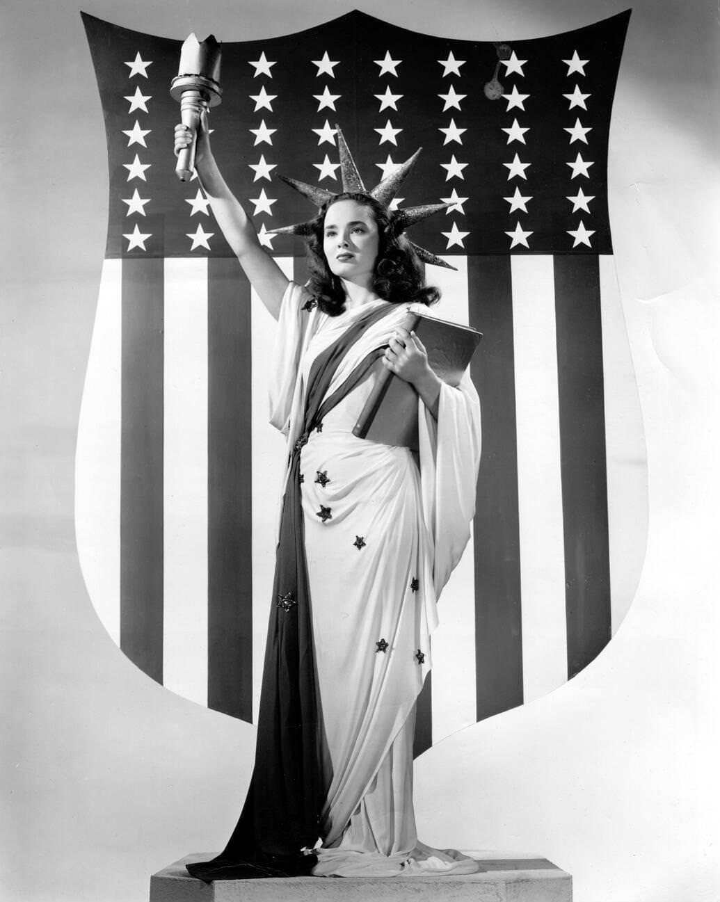 Ann Blyth Posing As The Statue Of Liberty.