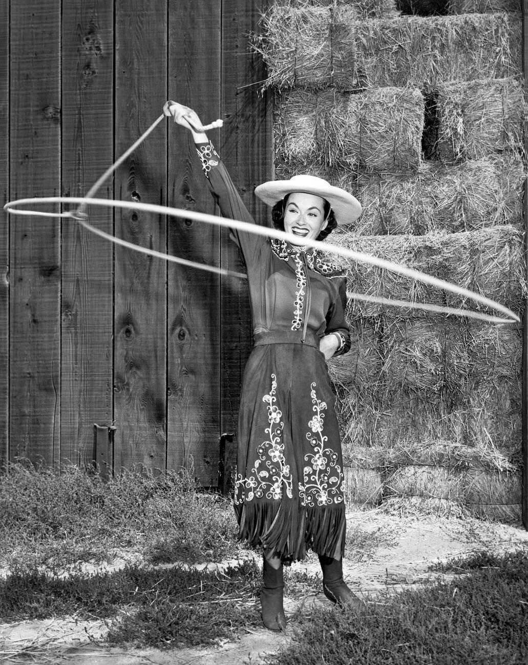 Actress Ann Blyth Shows Off Her Cowgirl Rope Spinning Skills, 1954.