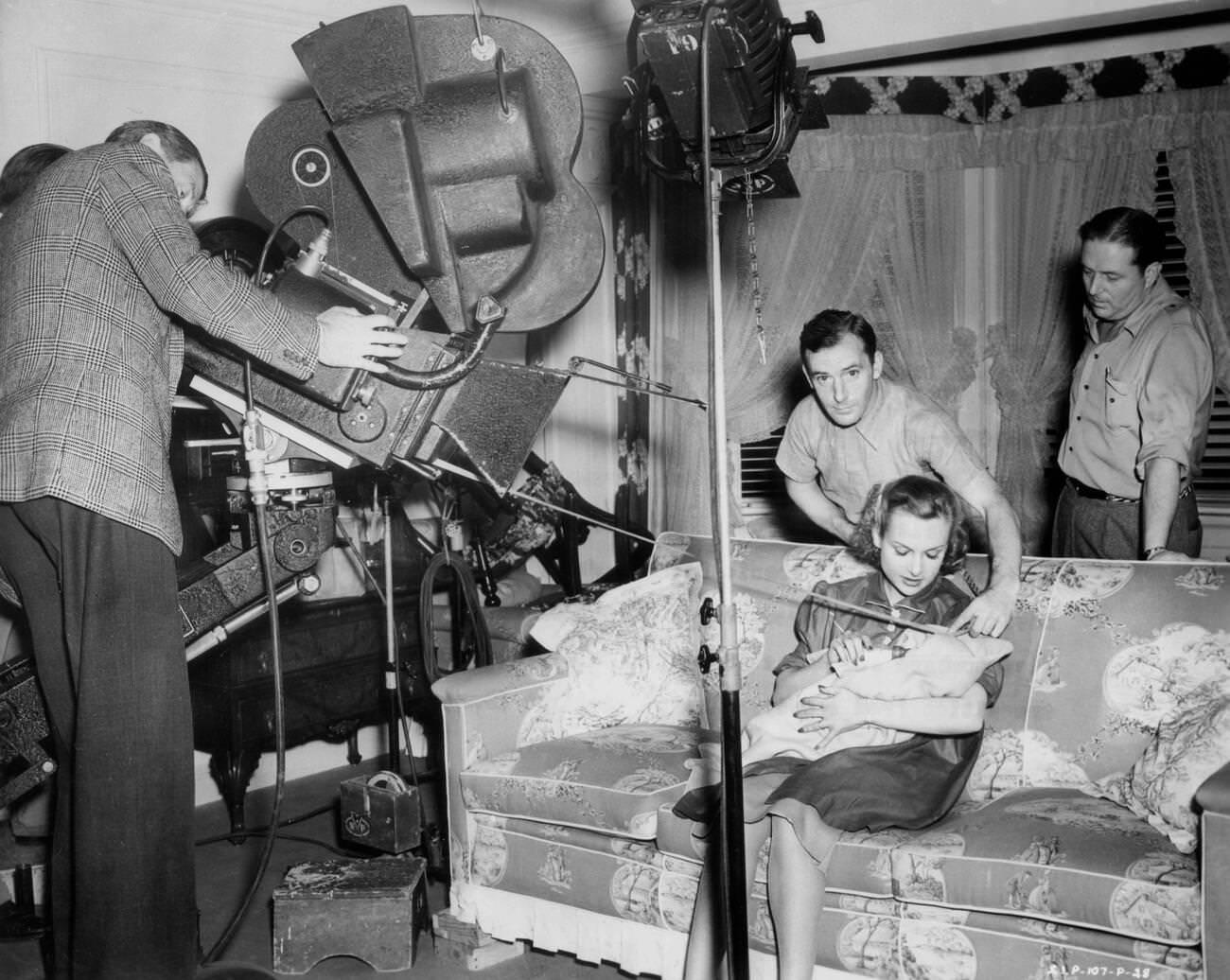 Director John Cromwell Peers Through The Camera During Filming Of 'Made For Each Other', 1939.
