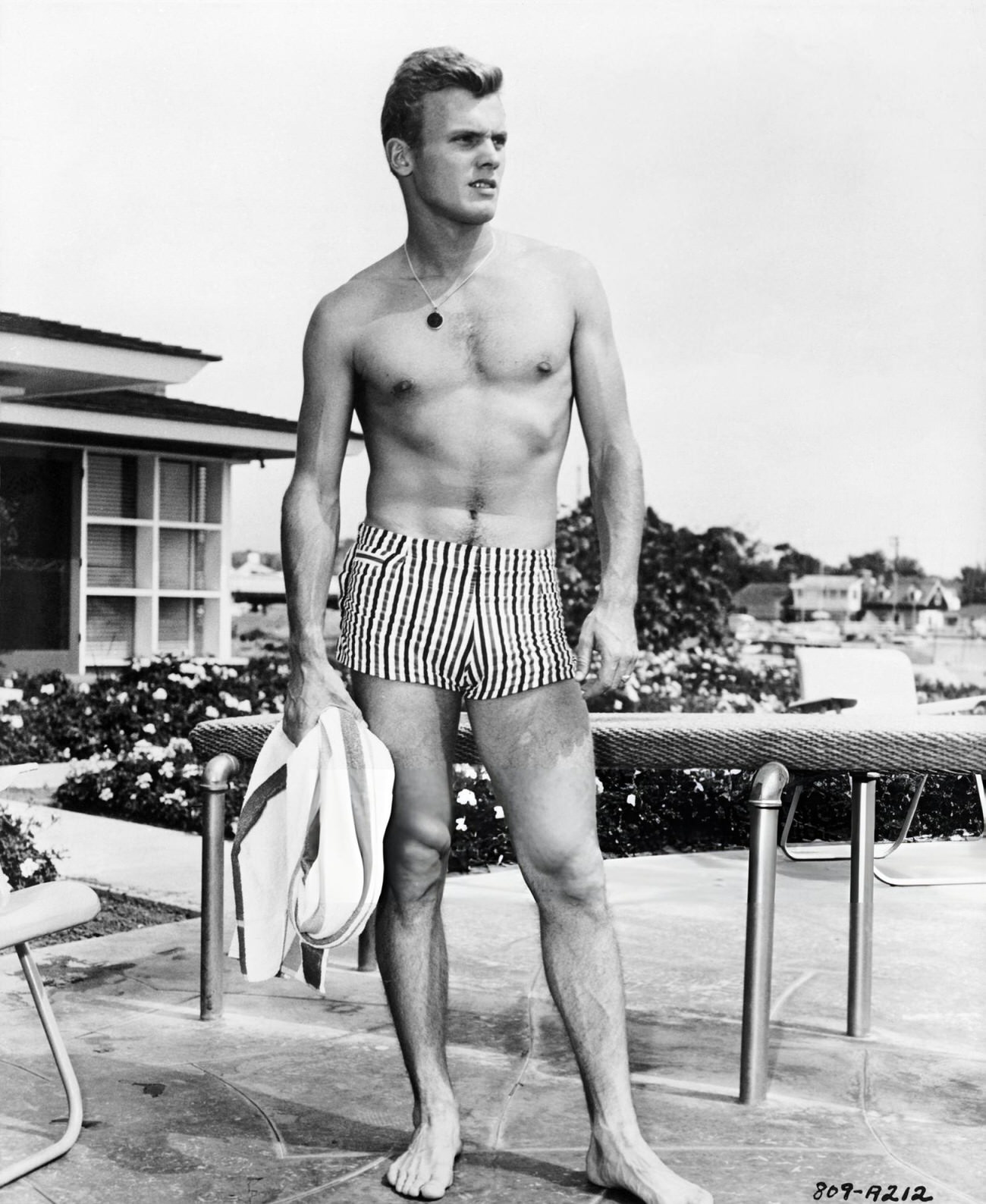 Tab Hunter Wearing A Bathing Suit.