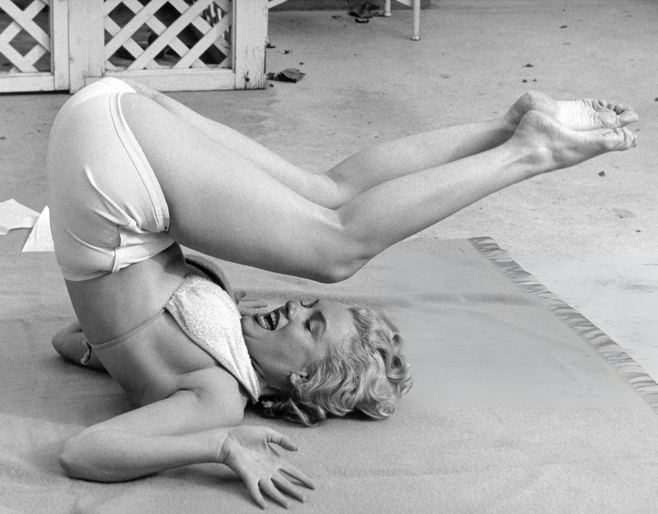 Marilyn Monroe Performing Stretching Exercises At The Hotel Bel-Air, 1953.