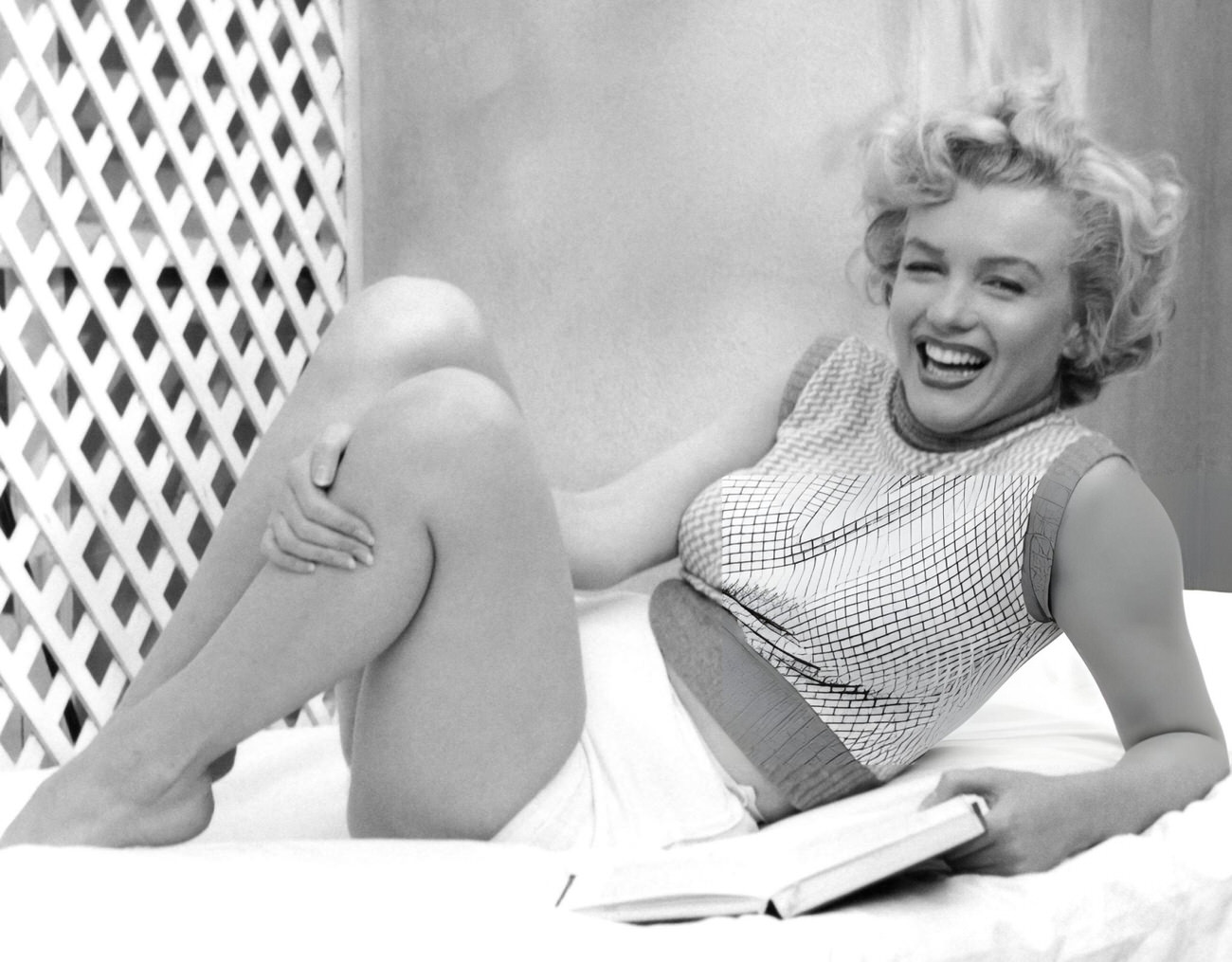 Marilyn Monroe On A Towel-Covered Deckchair At The Hotel Bel-Air, 1953.