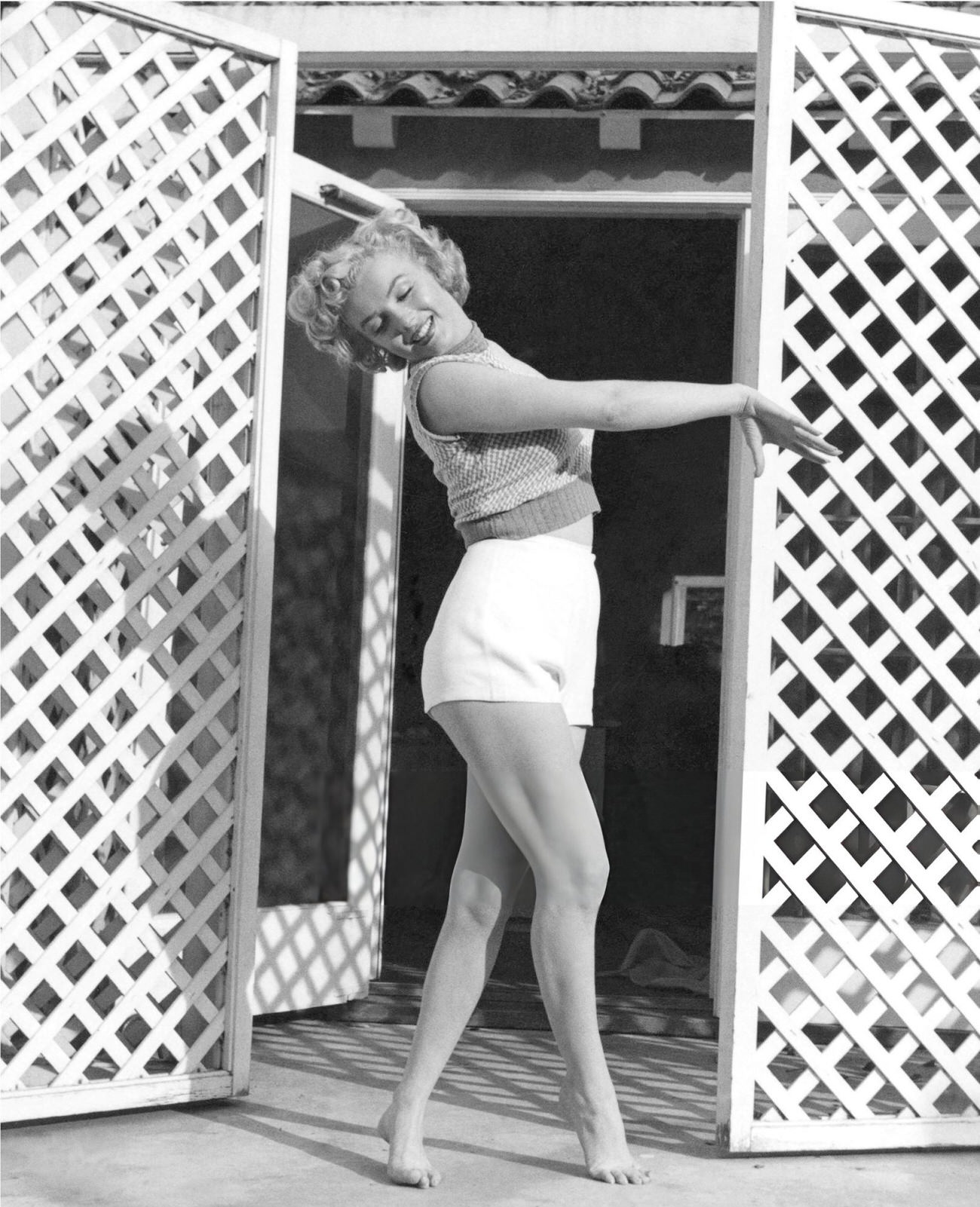 Marilyn Monroe Posing In Shorts At The Hotel Bel-Air, 1953.