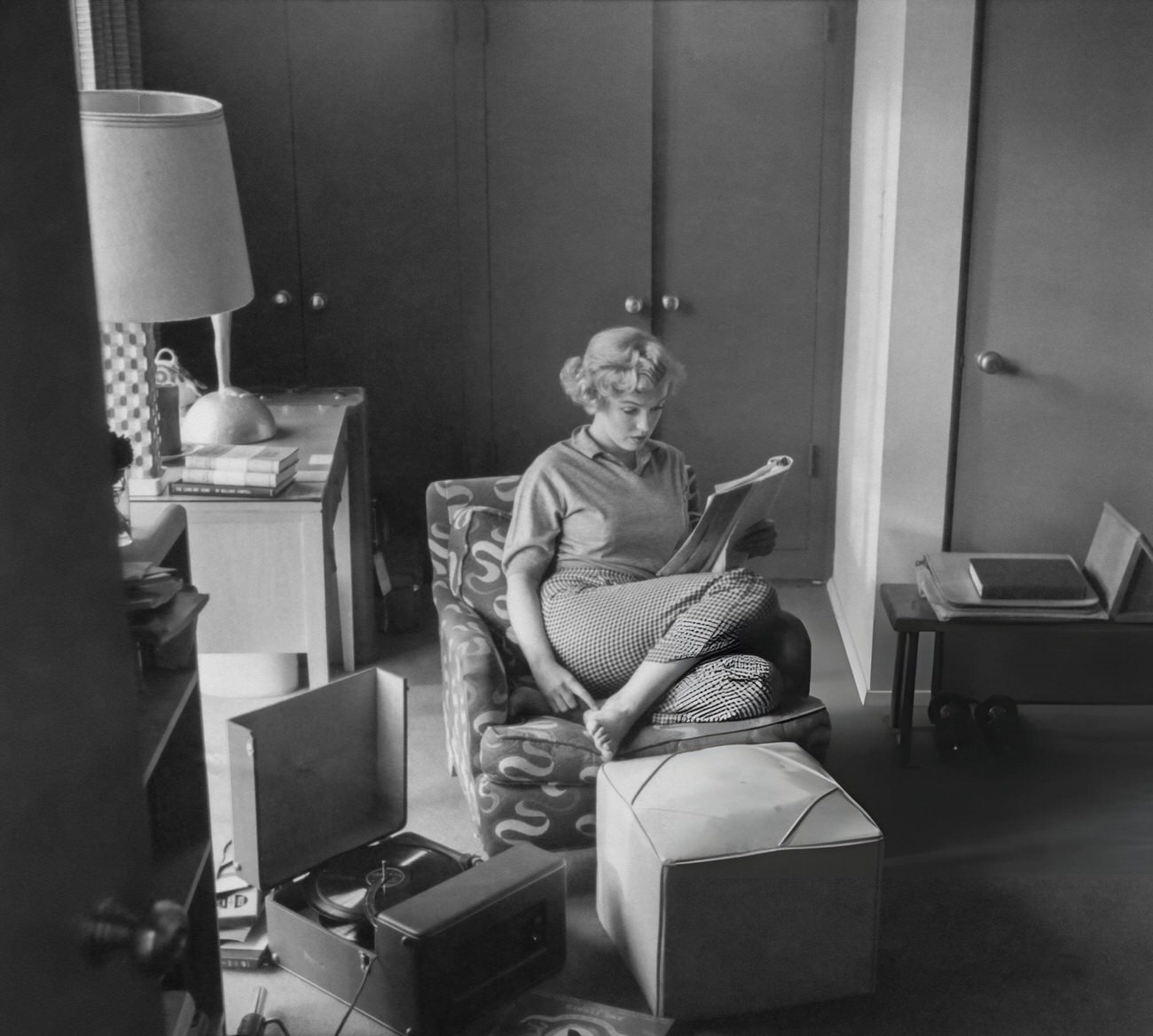 Marilyn Monroe Reading A Script In An Armchair At The Hotel Bel-Air, 1953.