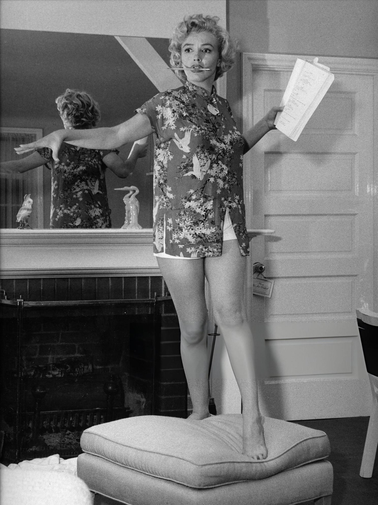 Marilyn Monroe Reading A Script On An Ottoman At The Hotel Bel-Air, 1953.