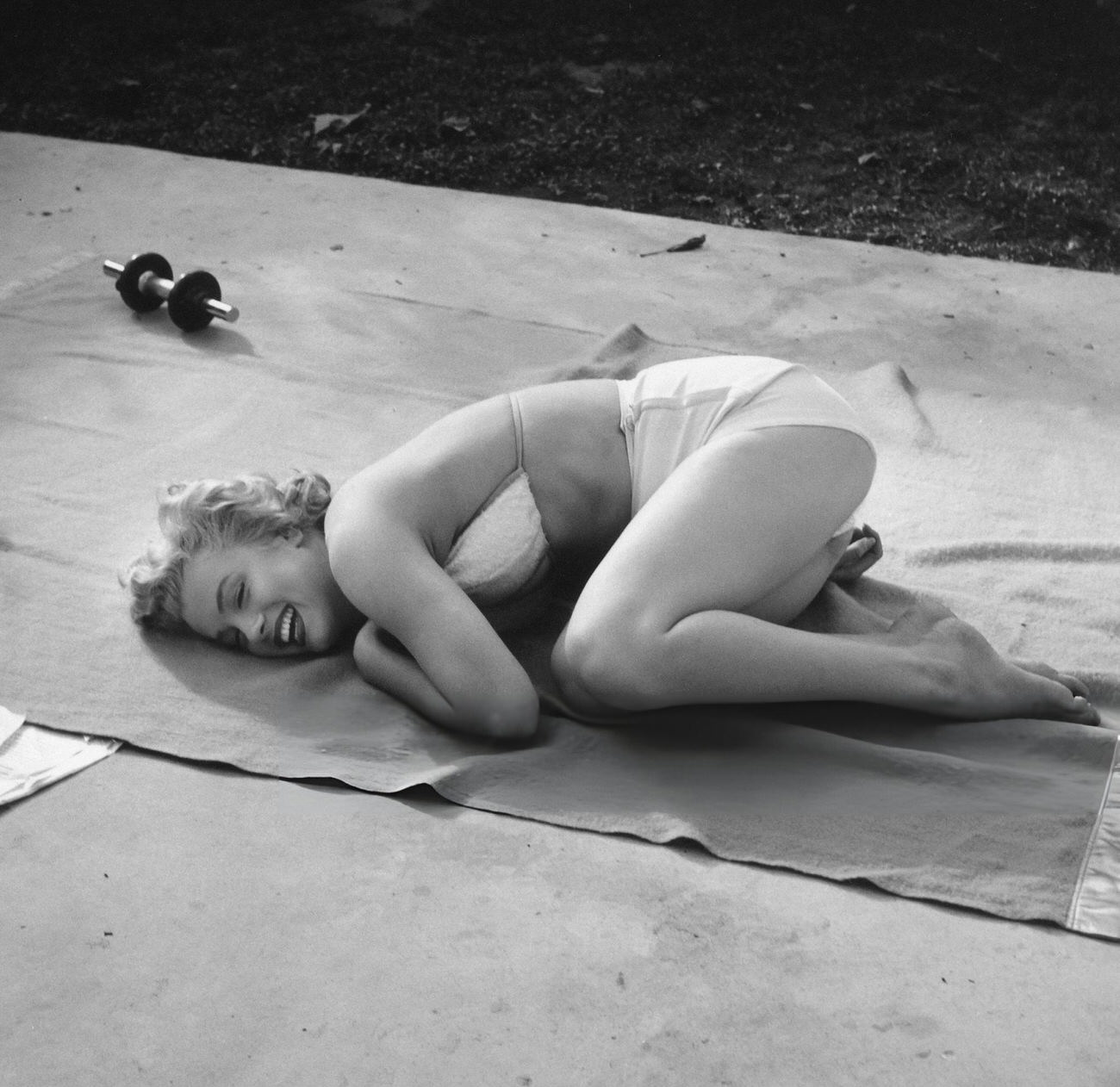 Marilyn Monroe Performing Stretching Exercises At The Hotel Bel-Air, 1953.