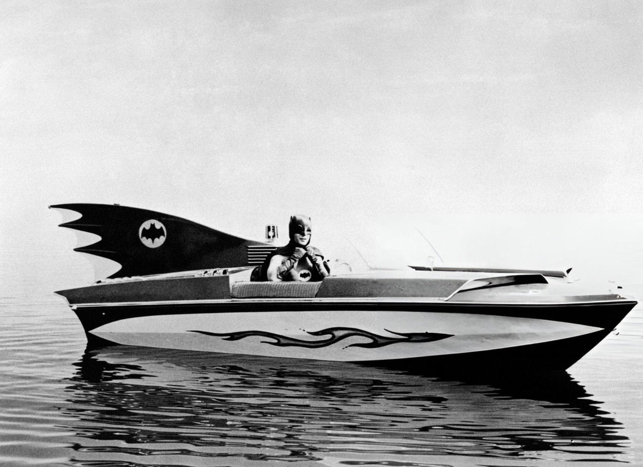 Adam West In Costume As Batman And Driving The Batboat, 1966.