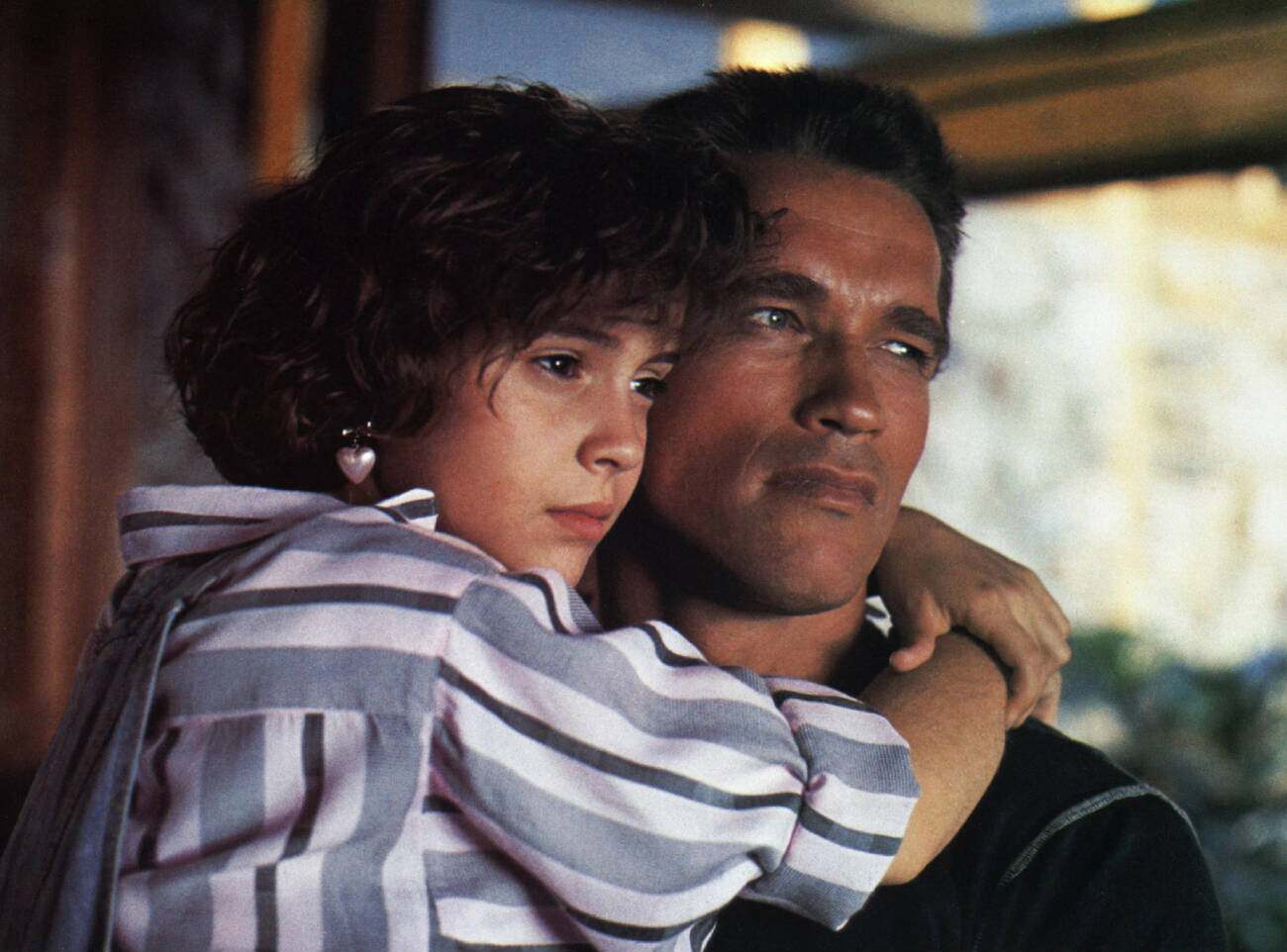Alyssa Milano And Arnold Schwarzenegger In Commando, 1985.