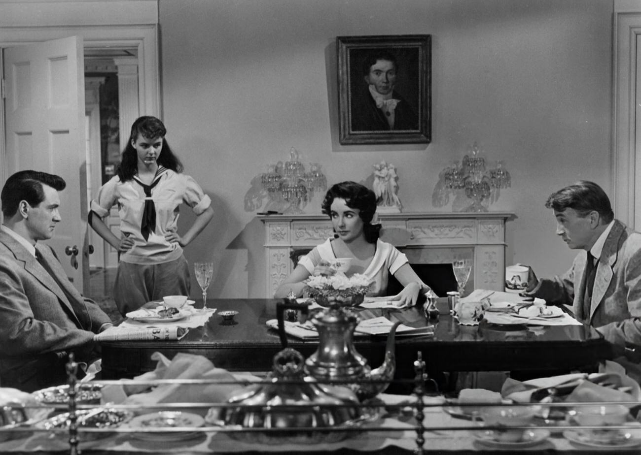 Rock Hudson, Elizabeth Taylor, And Chill Wills At A Dining Table In ‘Giant’, 1956