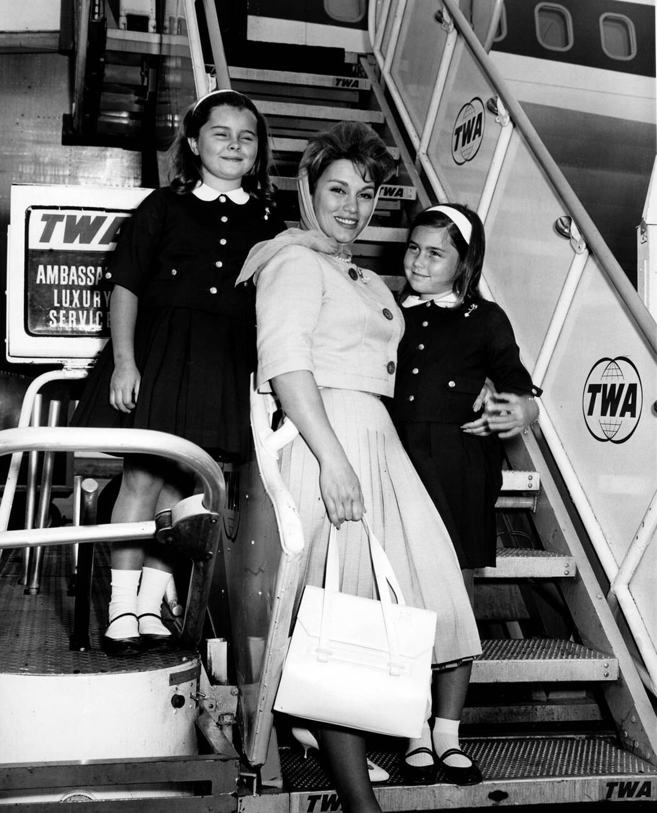 Linda Christian Traveling With Her Daughters.