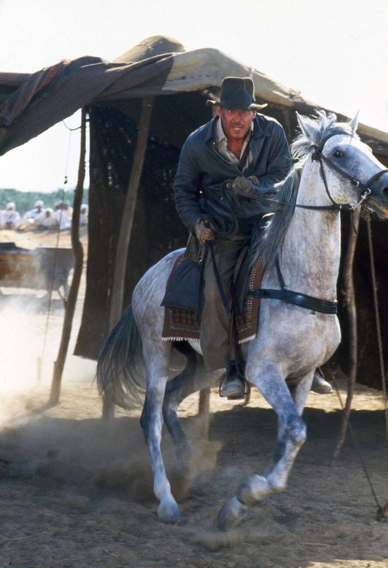 Harrison Ford On Horseback As Indiana Jones In ‘Raiders Of The Lost Ark’, 1981.