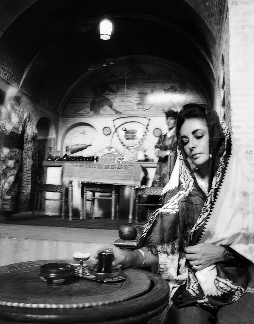 At The Teahouse, A Close-Up Of Taylor With Downcast Eyes