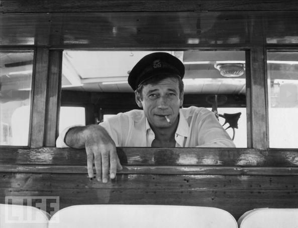 Yves Montand Regards His Passengers On Board His Yacht At Cannes, 1965.