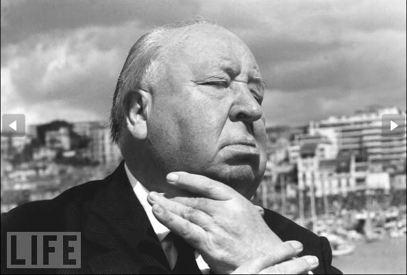 Alfred Hitchcock Strikes A Suicidal Pose At Cannes, 1972.
