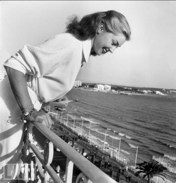 Esther Williams Throws Autographs Off A Balcony To Her Fans During The Cannes Film Festival, 1955.