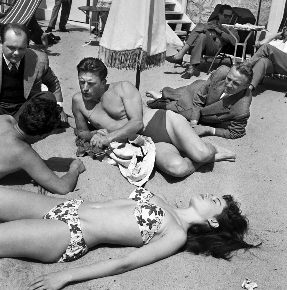 Kirk Douglas On The Beach At Cannes With Brigitte Bardot, 1953.