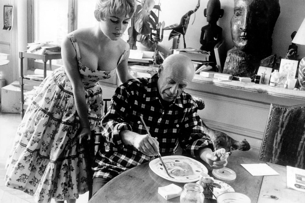 Actress Brigitte Bardot Watches Pablo Picasso At Work In His Studio During The Cannes Film Festival, 1956.