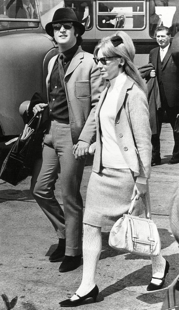 John Lennon Flies Out To The Cannes Film Festival With His First Wife Cynthia Lennon, 1965.