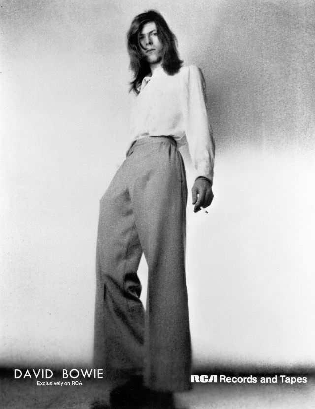 In Wide Leg Pants Posing For A Portrait Promoting The Hunky Dory Album In London, 1971.