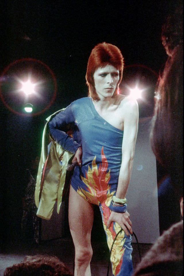 In An Asymmetrical Bodysuit Performing Onstage As Ziggy Stardust, 1972.
