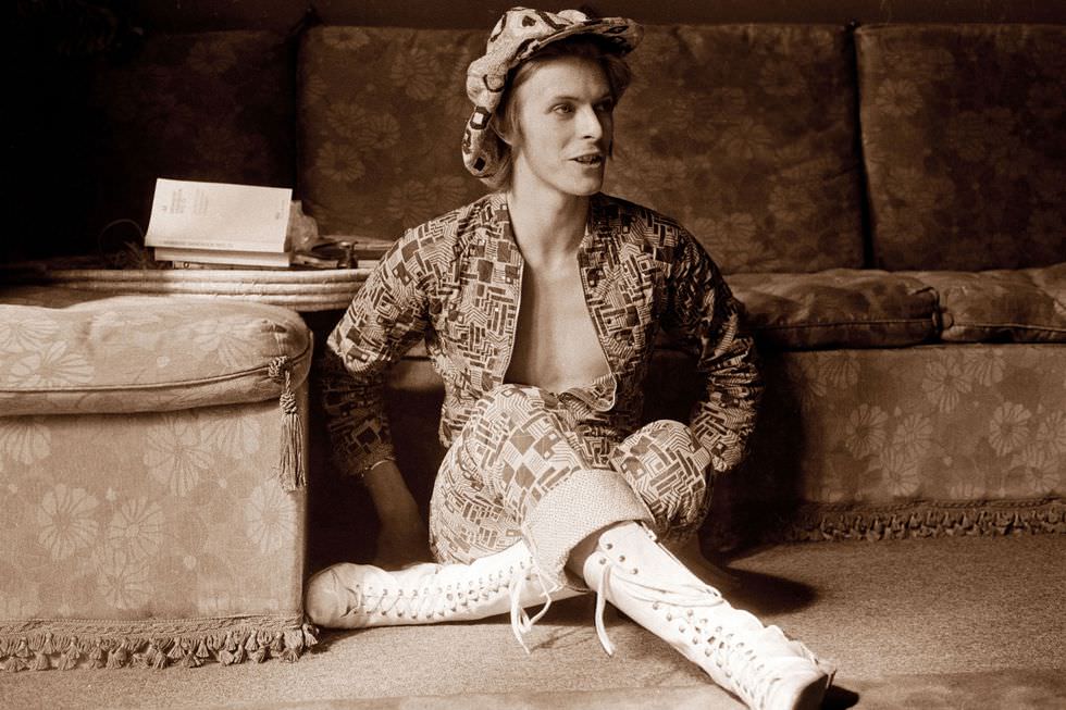 In Lace Up Boots And A Printed Jumpsuit Being Interviewed At Home In Beckenham, London, 1972.